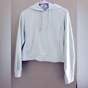 Activewear sweater in blue green color